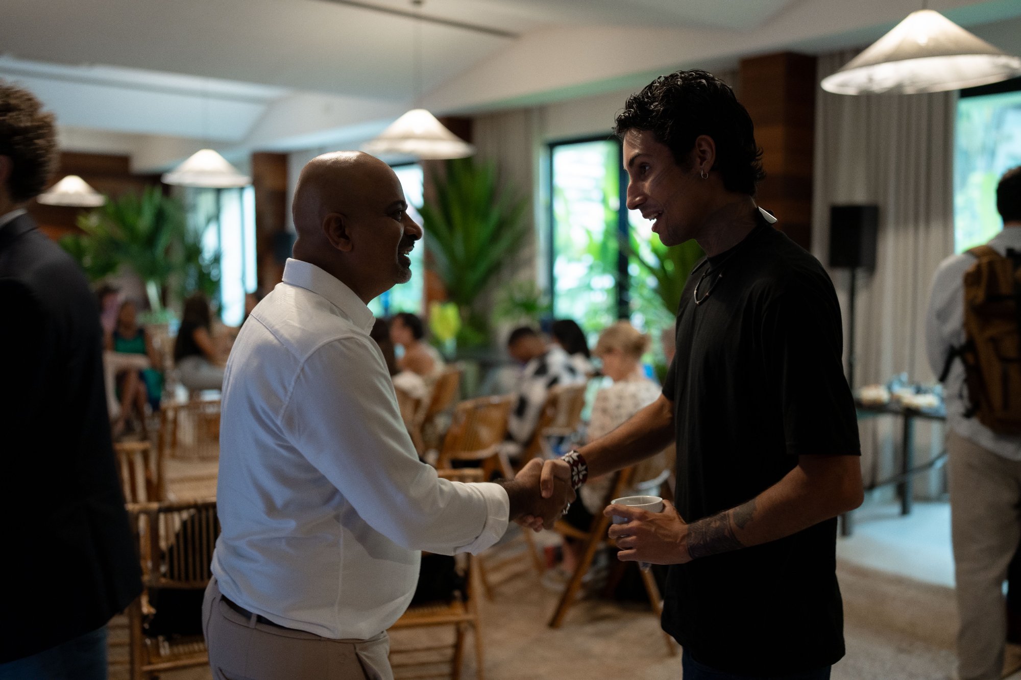 Two participants meeting at Actions House, COP30