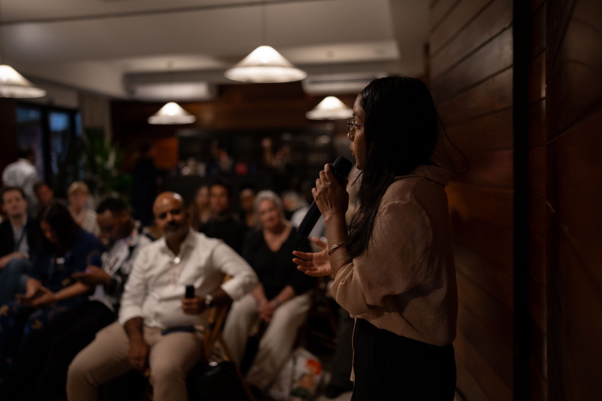 A founder presenting her venture at Actions House, COP30