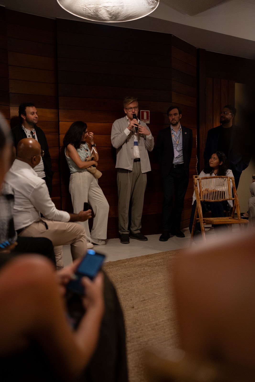 A participant addressing founders and mentors at Actions House, COP30